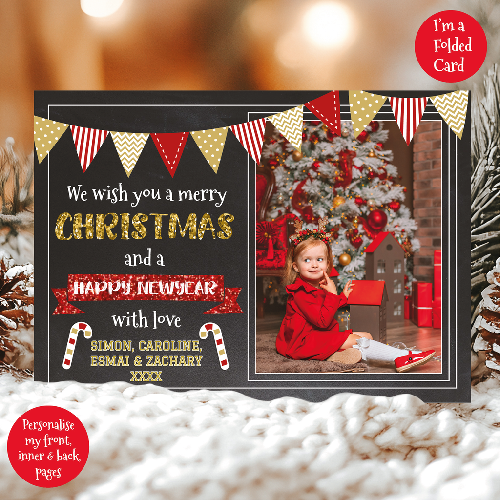 a christmas card with a photo of a baby in front of a christmas tree