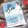 a christmas card with a baby sitting on a blanket