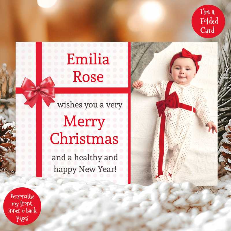 a christmas card with a photo of a baby
